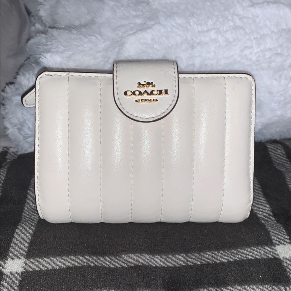 White coach wallet.